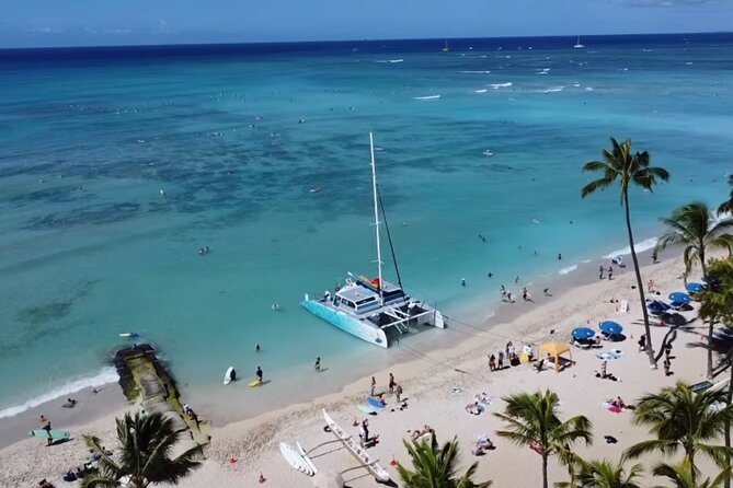 Board from Waikiki Beach for a scenic Sunset Sail on the Hāwea - Waikiki Beach at sunset, viewed from the Hāwea