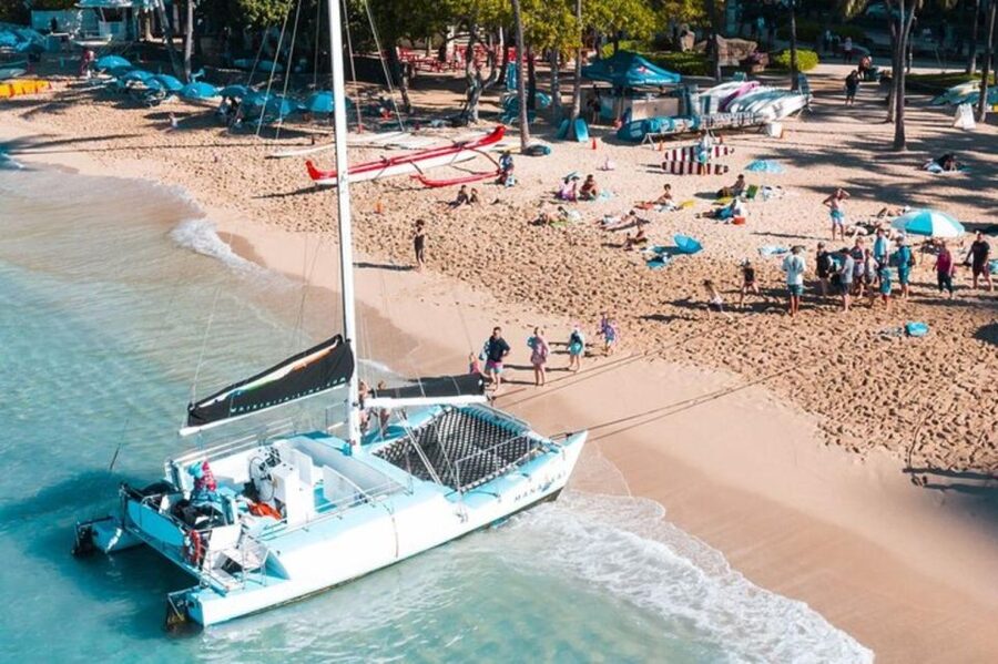 Board from Waikiki Beach: Scenic Sunset Sail on the Hāwea - Setting out from the Duke Kahanamoku Statue