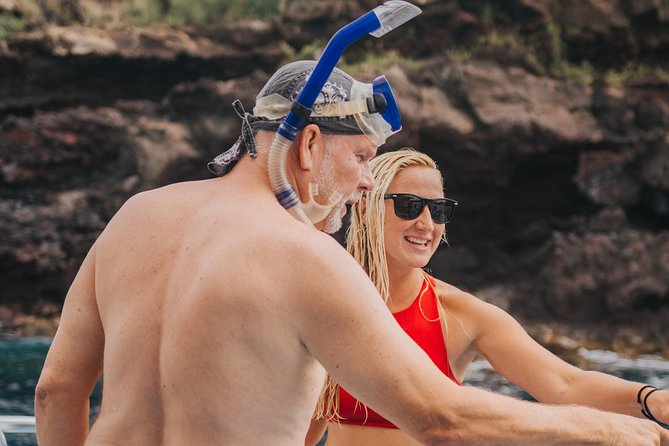 Deluxe Snorkel & Dolphin Watch Aboard a Luxury Catamaran from Kailua-Kona - Slides, high jumps, and floating toys keep the water time lively
