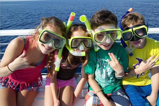 Deluxe Snorkel & Dolphin Watch Aboard a Luxury Catamaran from Kailua-Kona - Boarding at Kailua Pier and breakfast on the way out