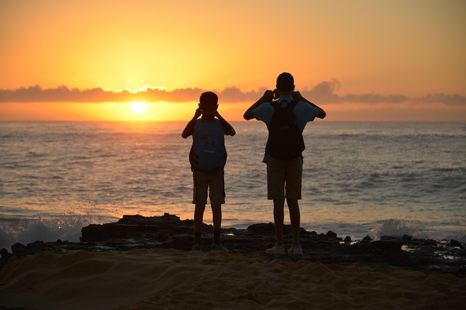 First Day Must: Oahu Sunrise & Circle Island Adventure - Kawela Bay offers a more playful North Shore pause
