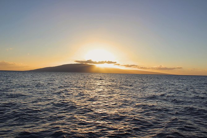 From Ma'alaea Harbor: Sunset Dinner Cruise Aboard the Quicksilver - Out on the water, with Lanai in the distance