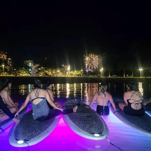Honolulu: Fireworks Glow and Flow Yoga Class - Meditation with the board gently moving