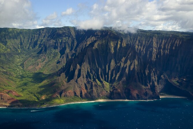 Kauai Airplane Tour: Na Pali Coast, Waterfalls & Window Seats - The south shore and Kauai’s old stories