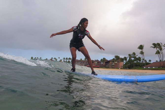 Kauai's Ultimate Semi-Private Surf Lesson - Getting into beginner-friendly waves