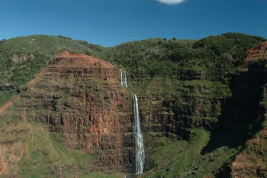 Kauai: Waimea Canyon and Waterfall Adventure Day Tour - Wailua Falls brings the first big view