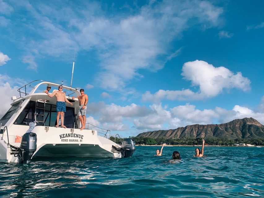 Oahu: Private Catamaran Sunset Cruise & Optional Snorkeling - Diamond Head views and marine life from offshore