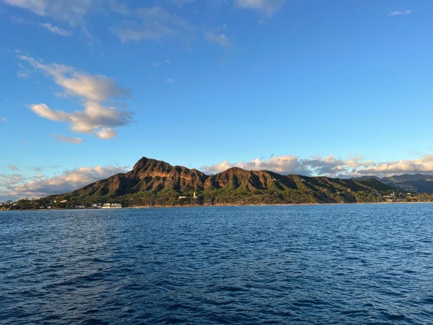 Oahu: Private Catamaran Sunset Cruise & Optional Snorkeling - Sunset, music, and the return to the harbor