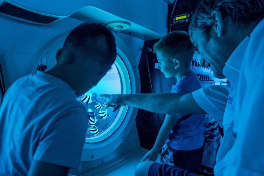 Oahu: Waikiki Submarine Tour - Entering the 64-passenger submarine