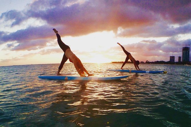 Paddleboard Yoga Class in Honolulu - Savasana while the ocean rocks your board