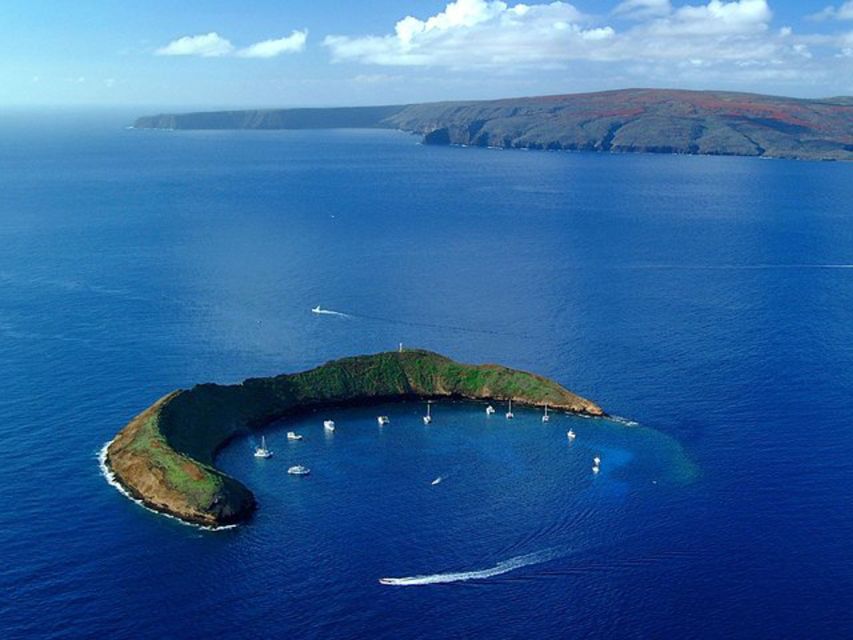 South Maui: Snorkel to Coral Gardens or Molokini Crater - Getting into the water at the reef