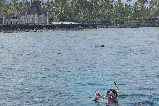 Two Reef Snorkel Trip-See Captain Cook Monument & Sea Caves - Coastal caves, lava tubes, and stories from the boat