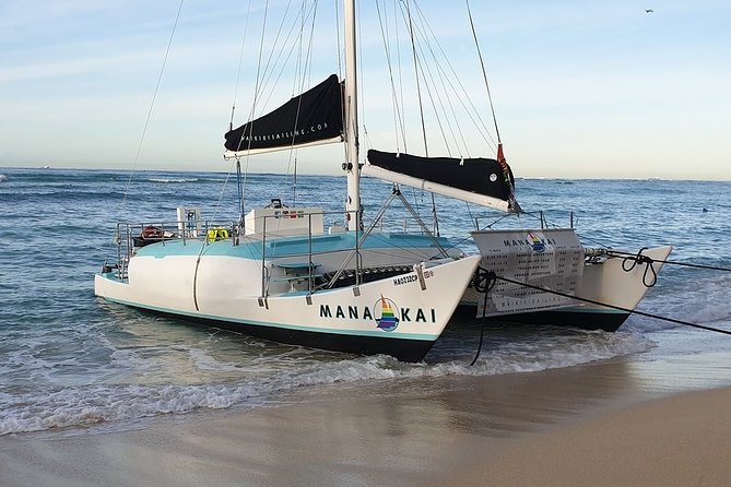 Waikiki Turtle Snorkel and Sail on Hawea Catamaran - Crew support in the water